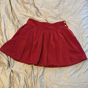 Pleated mini skirt with pockets